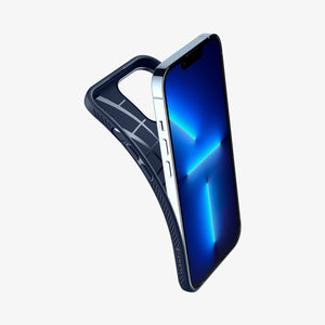 Spigen Liquid Air case for iPhone 13 Pro in Navy Blue – flexible case being fitted around the phone