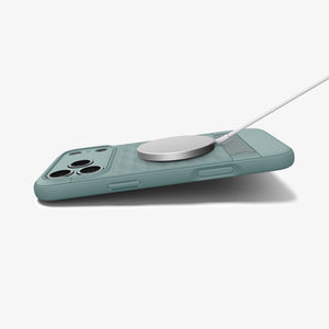 Spigen iPhone 17 Pro Parallax S MagFit case in Sage Green - MagSafe charging view