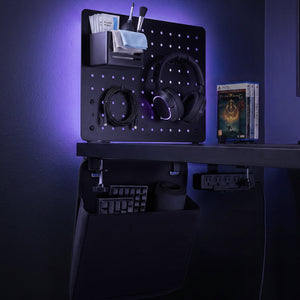 Black Spigen LD406 pegboard organizer in a gaming desk setup