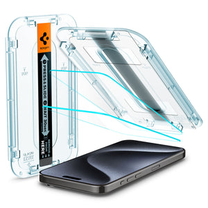 Spigen iPhone 15 Pro Screen Protector – GLAS.tR EZ Fit – two tempered glass protectors and EZ Fit trays above the phone