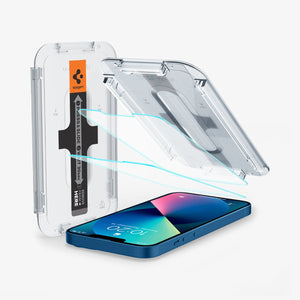 Spigen iPhone 13 Mini Screen Protector – GLAS.tR EZ Fit – EZ Fit alignment tray and tempered glass above an iPhone 13 Mini