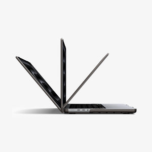 Spigen MacBook Pro 14-inch Air Skin in Frost Black showing three MacBook units opened at different angles to demonstrate the case allows full range of motion beyond 90 degrees