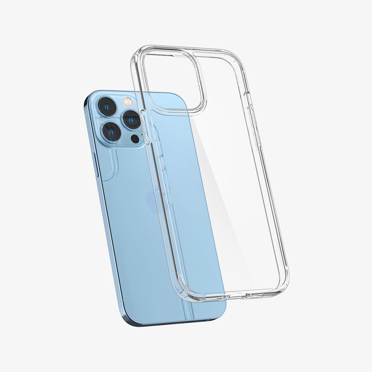 Spigen iPhone 13 Pro Max Case – Ultra Hybrid - Crystal Clear case hovering behind the device