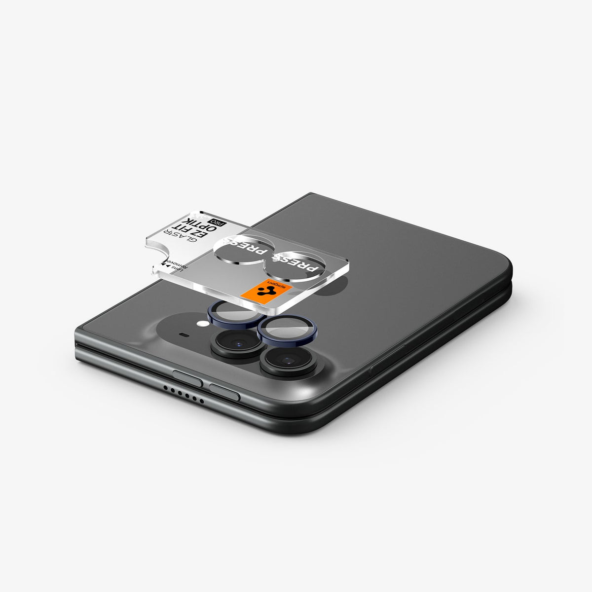 iPhone Duo Optik Pro EZ Fit Lens Protector in Black showing the EZ Fit Optik Pro tray aligned above the camera lenses for easy installation