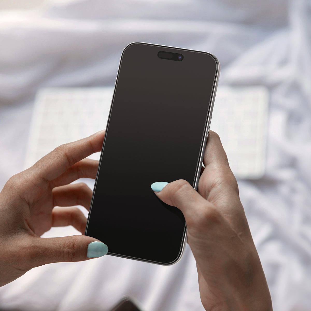 iPhone Pro display with the fitted clear GLAS.tR EZ Fit Pro glass protector