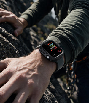 Apple Watch Series 12(42mm) Case Rugged Armor in Matte Black showing the rugged protective case worn during an outdoor climbing activity